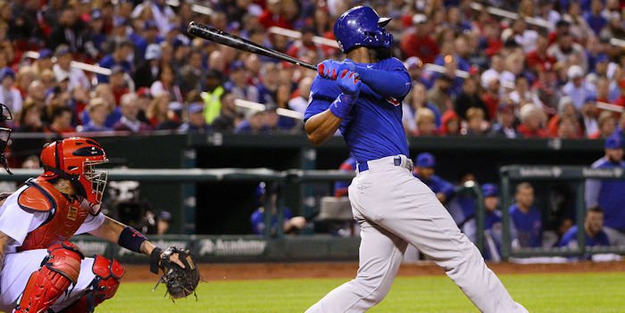 Chicago Cubs right fielder Jason Heyward (22) hits a one run single off of St. Louis Cardinals starting pitcher Adam Wainwright (50) during the fourth inning at Busch Stadium