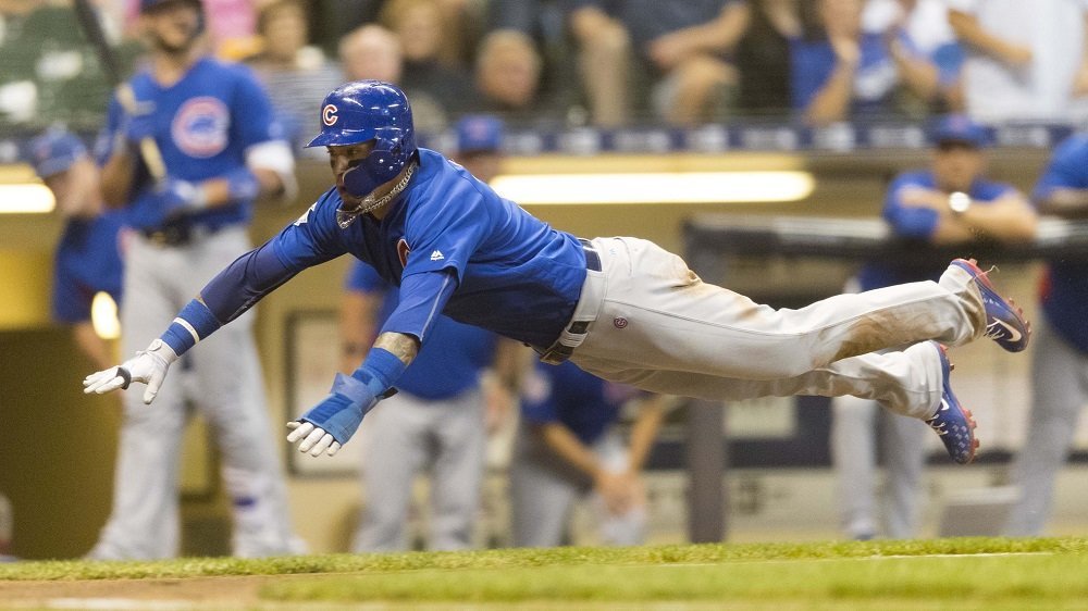Chicago Cubs middle infielder Javier Baez scored a critical run by way of his tenacious base running. (Photo Credit: Jeff Hanisch-USA TODAY Sports)
