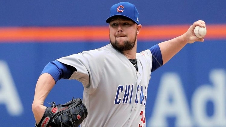 Lester has three 'pieces of metal' as a World Series Champion (Anthony Gruppuso - USAT)