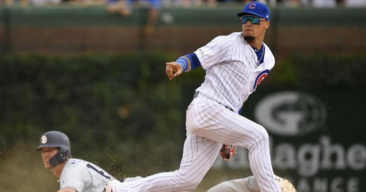 Javier Baez helped keep the Cubs' 1-run lead intact in the ninth inning by applying one of his signature no-look tags. (Credit: Quinn Harris-USA TODAY Sports)