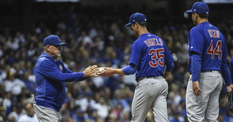 Chicago Cubs starting pitcher Cole Hamels did not remain in Friday's game for very long. (Credit: Benny Sieu-USA TODAY Sports)