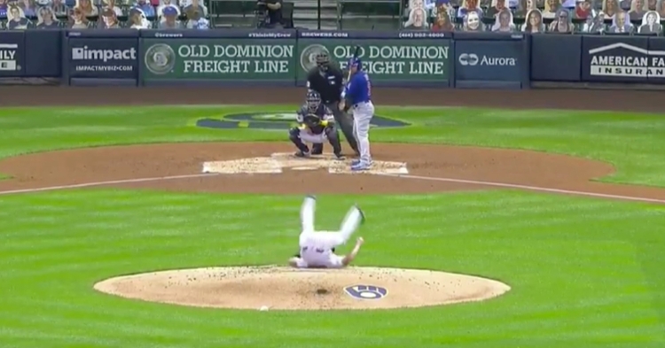There was audible laughter from both dugouts after Brewers pitcher Brent Suter slipped and fell on the mound.
