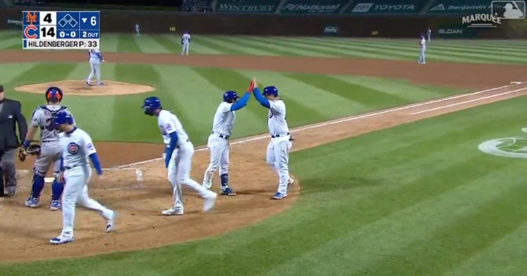 Leaving the bat at 103.9 mph and 29 degrees, Javier Baez's grand slam made the score 14-4 in favor of the Cubs.