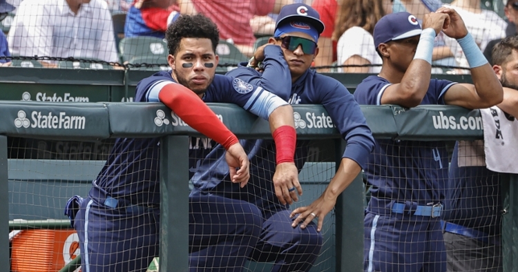 Contreras and Alzolay watch from the dugout (Kamil Krzaczynski - USA Today Sports)