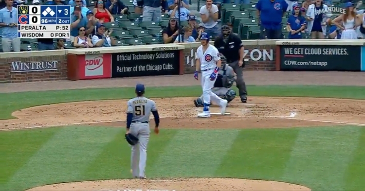 WATCH: Patrick Wisdom flips his bat, stares down pitcher after drawing  bases-loaded walk