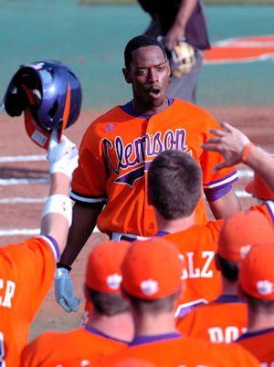 The Tigers celebrate Chris Epps' homer that led off the season.