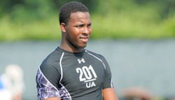Dawson torn between two schools