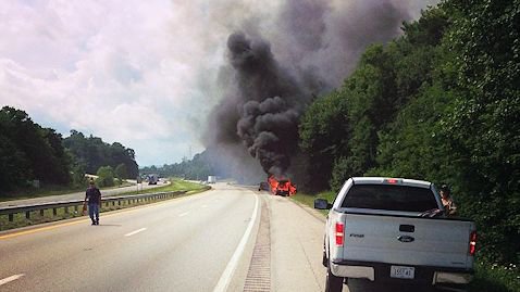 Photo of the burning car from Tig Willard.