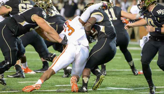 Vic Beasley takes down a Wake runner in the first half