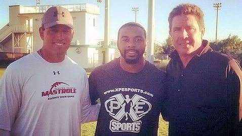 Tajh Boyd with Ken Mastrole and Dan Marino. <span style=