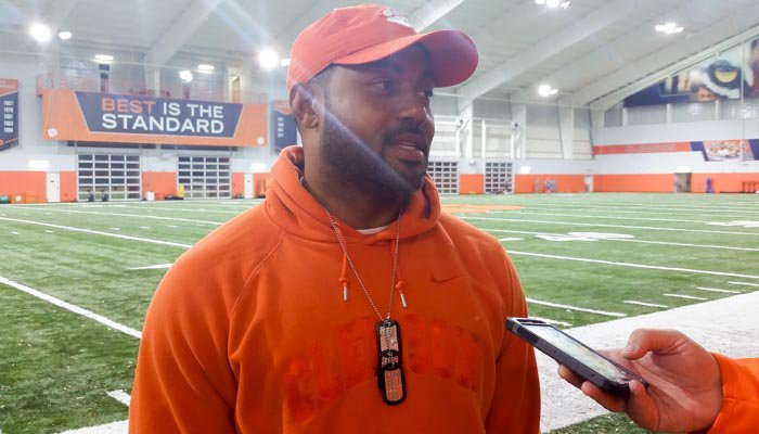 Mike Reed proudly wears his dog tags for all to see