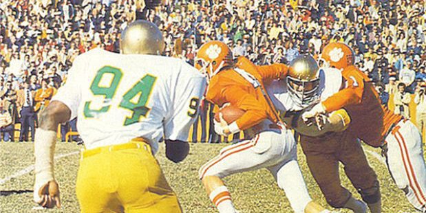 Fuller carries the ball against ND in 1977 (Photo courtesy of Clemson SID)