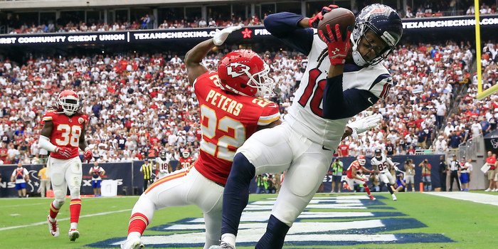 Nuk Hopkins catches a TD pass Sunday against the Chiefs (Photo by Kevin Jairaj)