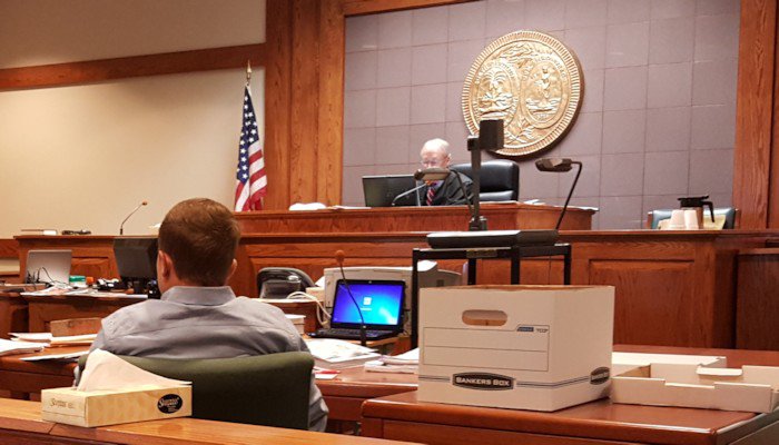 Micah Rogers sits in court Wednesday morning