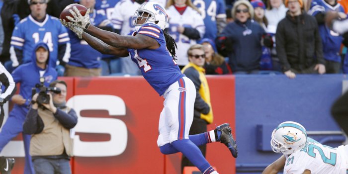 Watkins catches a pass for a touchdown as Miami Dolphins cornerback Brent Grimes pursues during the 3rd quarter at Ralph Wilson Stadium. . <span style=