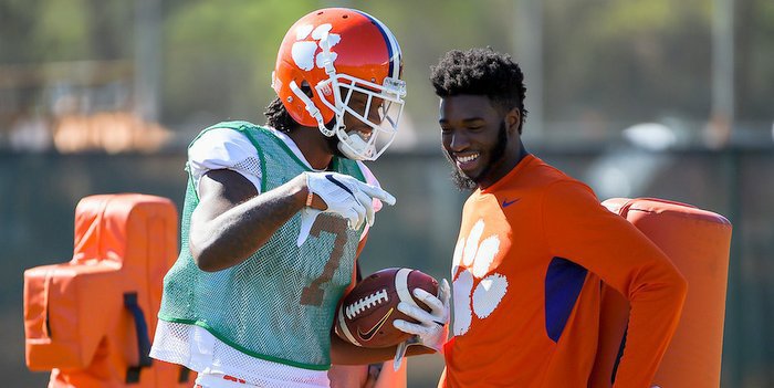 Cain and wide receiver Mike Williams at practice last week