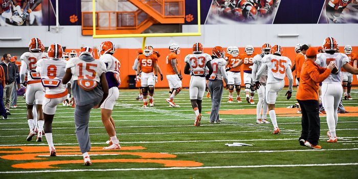 The Tigers work out in the indoor practice facility
