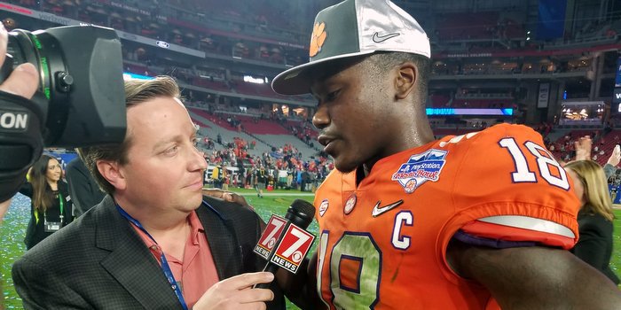 Johnson talks to the media after the game