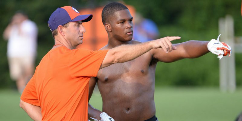 McMillan and Dabo Swinney talk during Swinney's camp