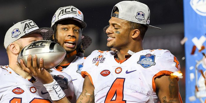 Watson admires the ACC Championship trophy last Saturday