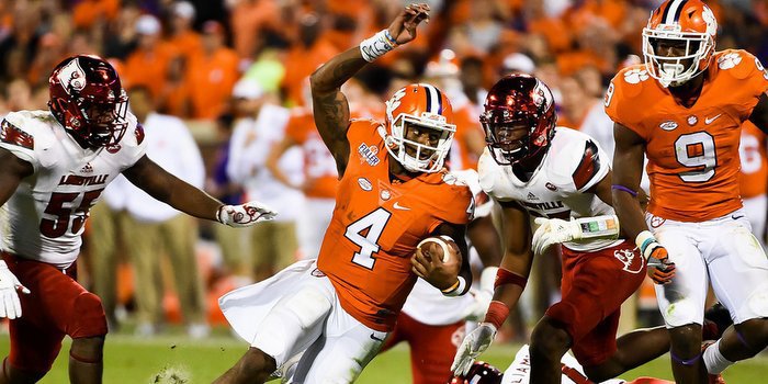 Watson carries the ball Saturday against Louisville