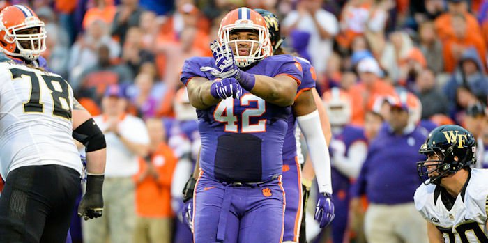 Wilkins displays his Power Rangers hand signal after big plays