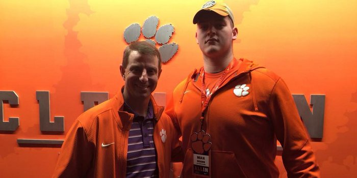DeHond poses with head coach Dabo Swinney last year