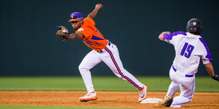 Jordan Greene turns a double play against the Paladins (photo by David Grooms)