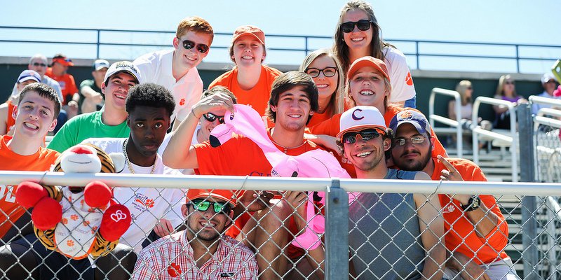 Marianos (in Clemson baseball hat on the right) says Damien has plenty of brothers and sisters for sale