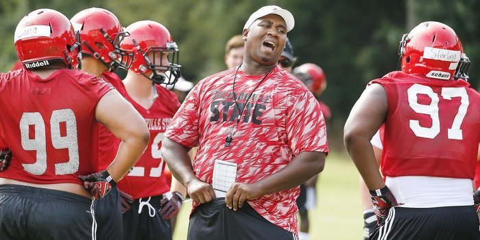 Stoudt says Bates (center) is a lot like Dabo Swinney (Photo courtesy of The Anniston Star)