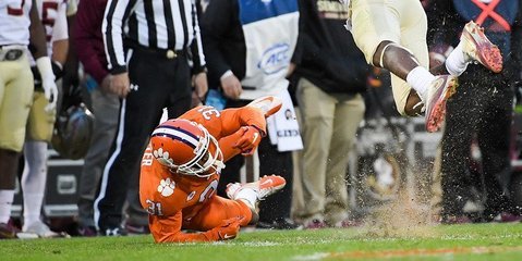 Rice about to target Carter's head on the punt return