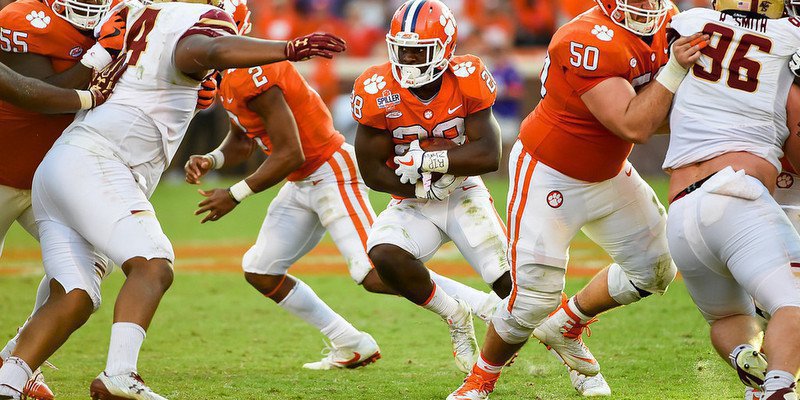Feaster carries the ball Saturday against Boston College