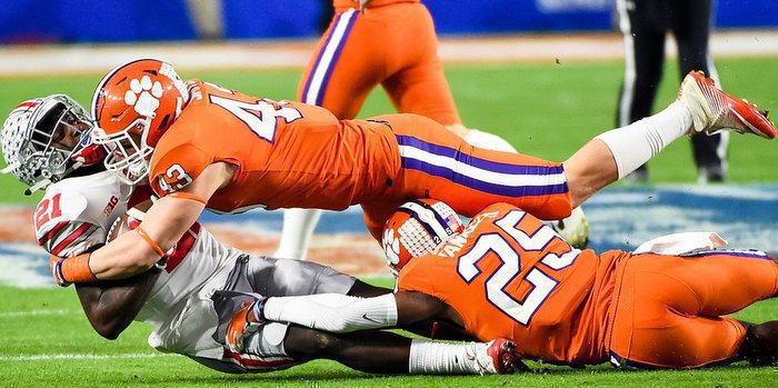 Smith makes a jarring tackle against Ohio St. in the Fiesta Bowl
