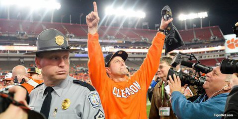 Swinney congratulates Syracuse players in their locker room