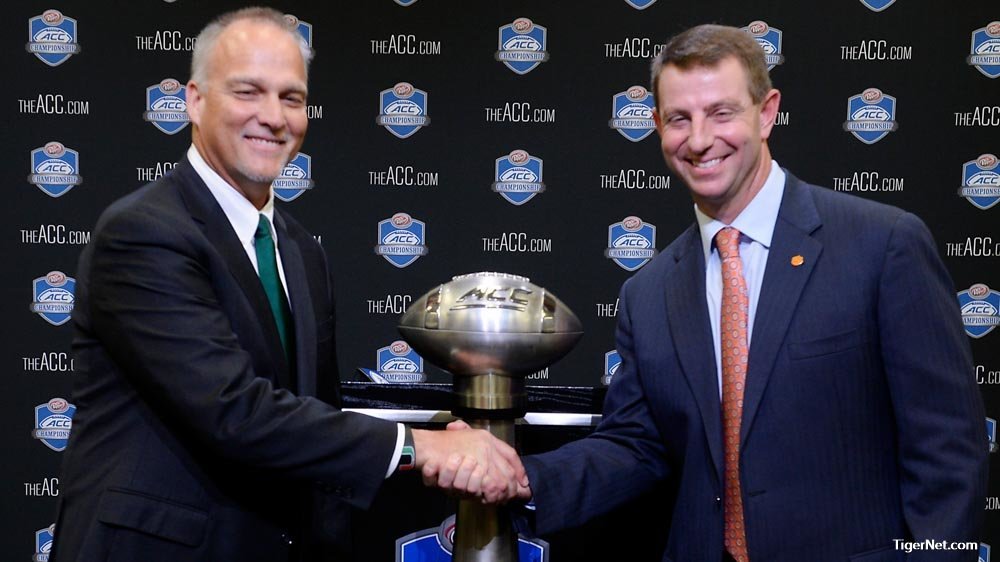 Miami's Mark Richt and Swinney shake hands after Friday's press conference.