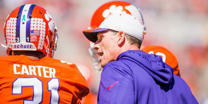 Venables gets in the ear of Ryan Carter during the spring game