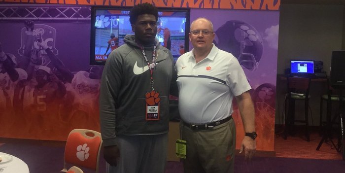 McNeill poses with area recruiter Robbie Caldwell