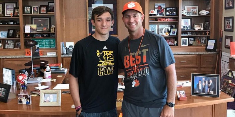 Potter poses with Dabo Swinney after his commitment