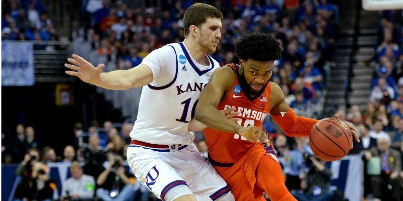 DeVoe drives the lane early against Kansas (Photo by Steven Branscombe, USA Today)