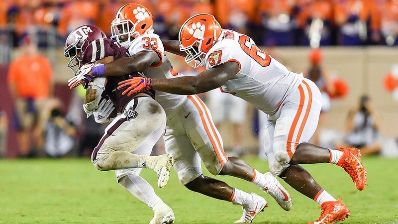 Davis (33) makes the tackle last Saturday at Texas A&M