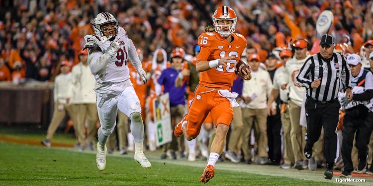 Trevor Lawrence runs for yardage against the Gamecocks