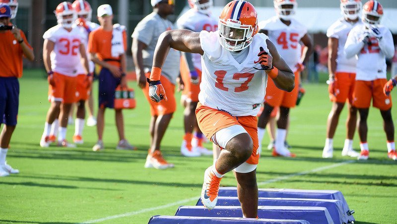 Justin Mascoll works out during practice