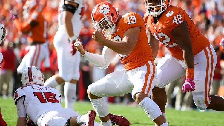 Tanner Muse celebrates a play against NC State last season.