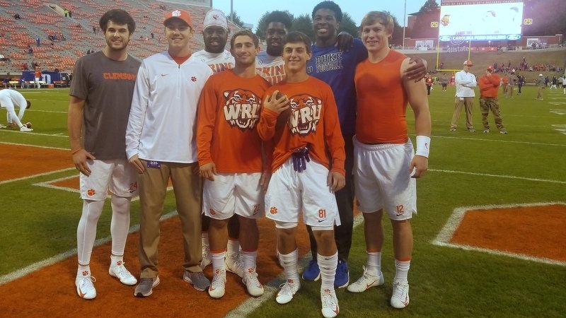 The group takes the picture before Saturday's game