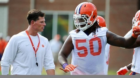Robinson is shown here with defensive coordinator Brent Venables