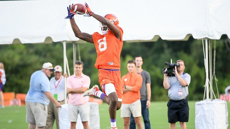 Justyn Ross makes a leaping catch during practice