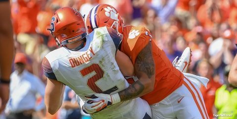 Xavier Thomas blasts the Syracuse quarterback last season