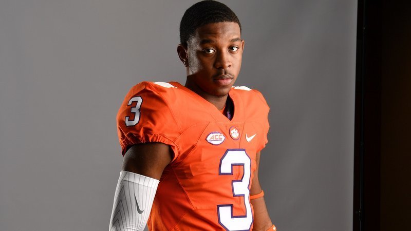 Flowers poses in a Clemson uniform