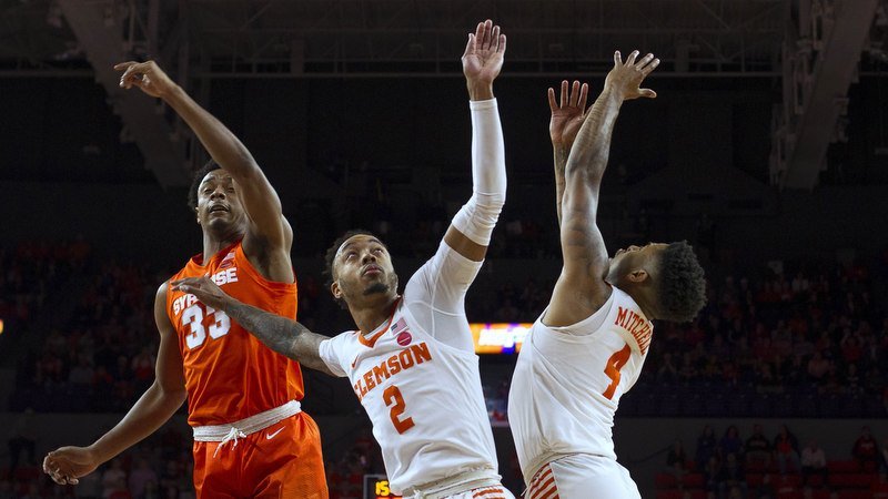 Reed and the seniors lead Tigers past Syracuse to improve NCAA hopes