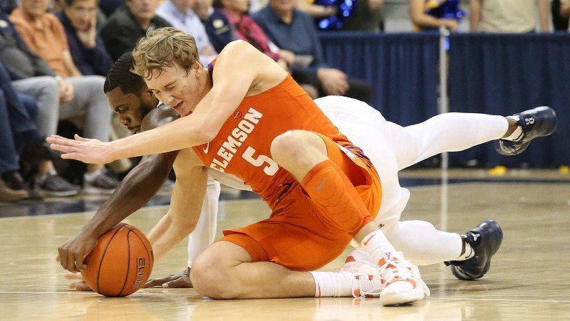 Hunter Tyson battles for a loose ball (Photo by Charles LeClaire, USAT)